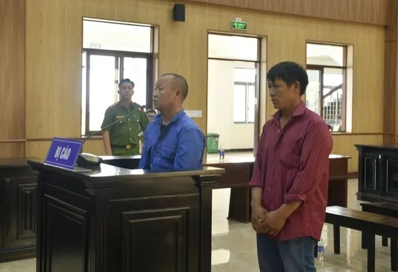 Tổ chức cho 13 người xuất cảnh trái phép, 2 bị cáo lĩnh án tù